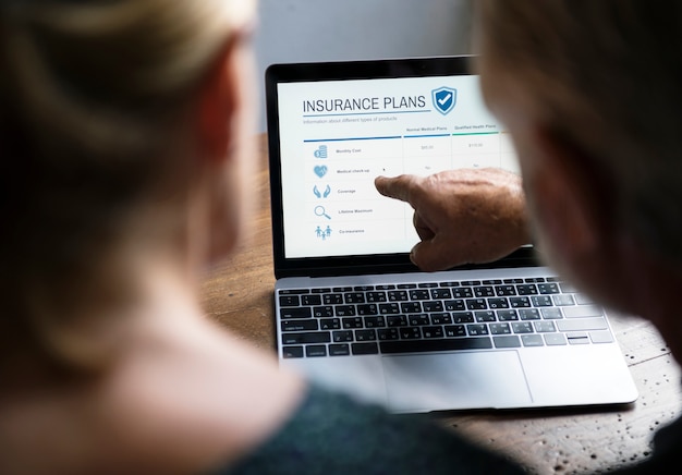 Someone using a laptop with the TreasuryDirect.gov website displayed on the screen, illustrating the process of checking for unclaimed funds online.
