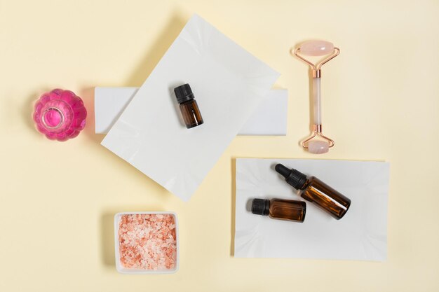 A visually appealing flat lay featuring various skincare sample packets and small containers on a clean, minimalist background. Includes serums, creams, and cleansers. The arrangement is neat and inviting, with soft, diffused lighting to highlight the textures and packaging of the products.
