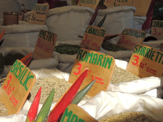 A close-up shot of a seed library shelf filled with various labeled seed packets, emphasizing the diversity of seeds available for free borrowing in the community.
