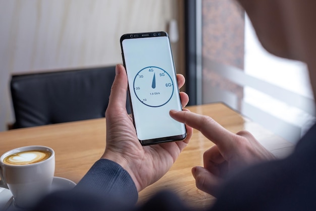 A person using a digital time tracking app on their phone to record their work hours. The interface of the app is clean and user-friendly, showing the date and time of entry and exit.