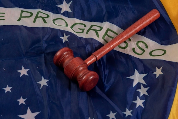 A close-up of a United States law book focusing on the section about labor laws and overtime pay. A hand is pointing to a paragraph discussing the Fair Labor Standards Act (FLSA).