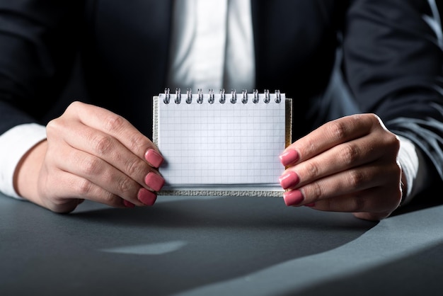 A hand pointing to a calendar with tax deadlines highlighted. The image emphasizes the importance of meeting tax deadlines to avoid penalties.